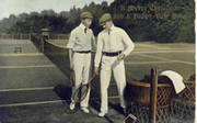 TWO MEN PREPARING FOR A GAME OF TENNIS