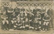 WESTMINSTER COLLEGE 1920S RUGBY TEAM POSTCARD