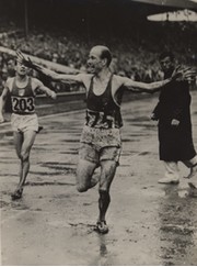 OLYMPIC GAMES 1948 PRESS PHOTOGRAPH - GASTON REIFF (BELGIUM) WINNING THE 5000M