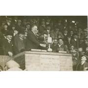 STANLEY SMITH (WAKEFIELD TRINITY) RECEIVING THE CHARITY CUP AT DEWSBURY 1920S - RUGBY LEAGUE POSTCARD