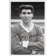 TONY DUNNE (MANCHESTER UNITED & IRELAND) SIGNED FOOTBALL PHOTOGRAPH