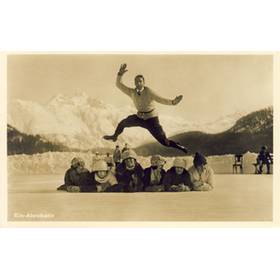 ACROBATIC SKATER LEAPING ABOVE A ROW OF MUFFLED LADIES (postcard)