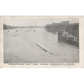 INTERNATIONAL BOAT RACE - PASSING HAMMERSMITH BRIDGE 1906 POSTCARD