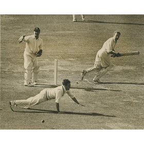 ENGLAND V AUSTRALIA 1953 (MORRIS GETS THE BALL PAST BAILEY) CRICKET PHOTOGRAPH
